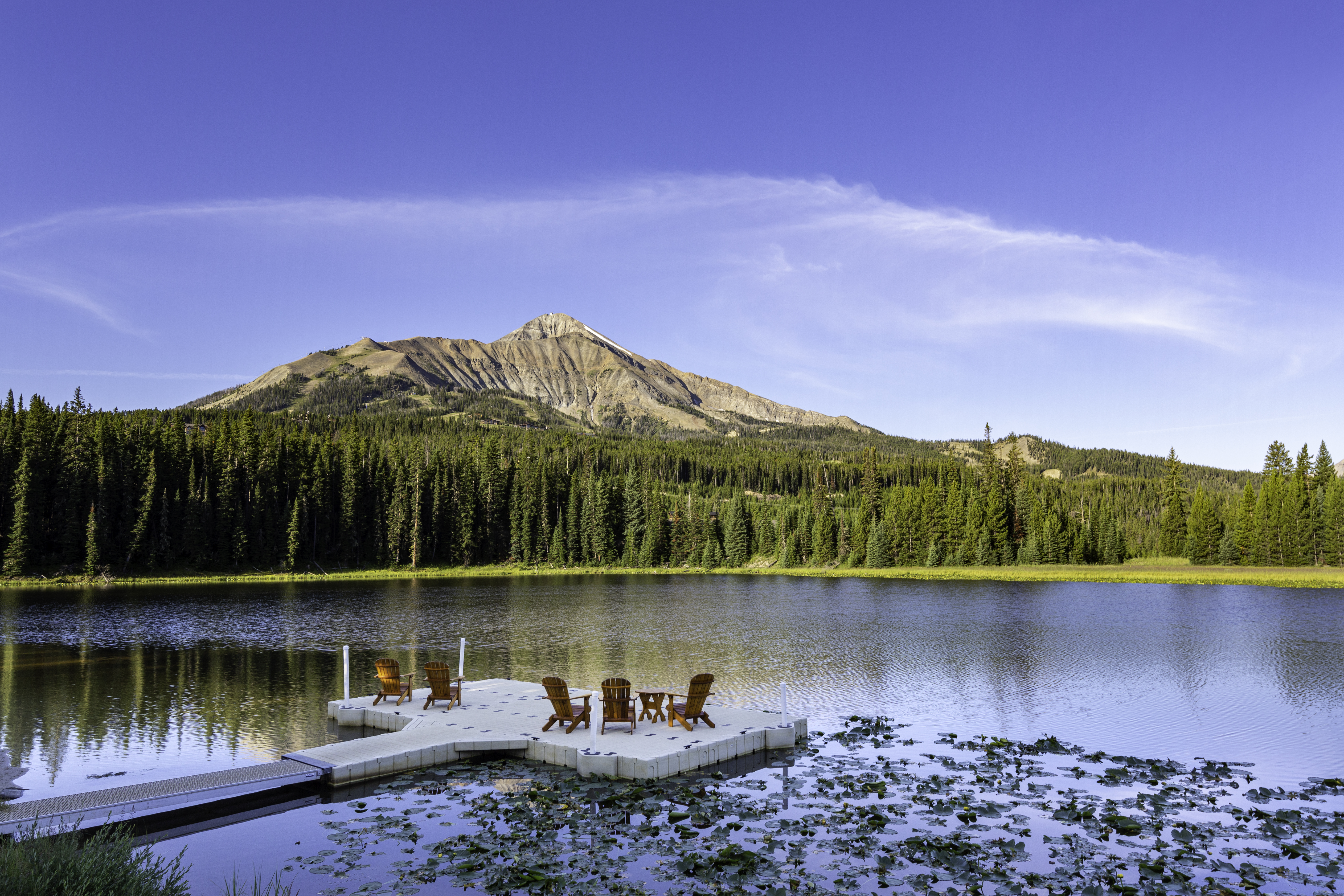 panoramic view of Montan's Big Sky Landscape with mountains and open medows in summer